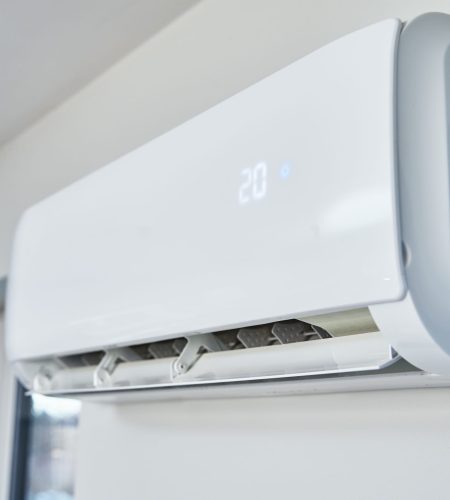 Air conditioner hanging on the wall, close up